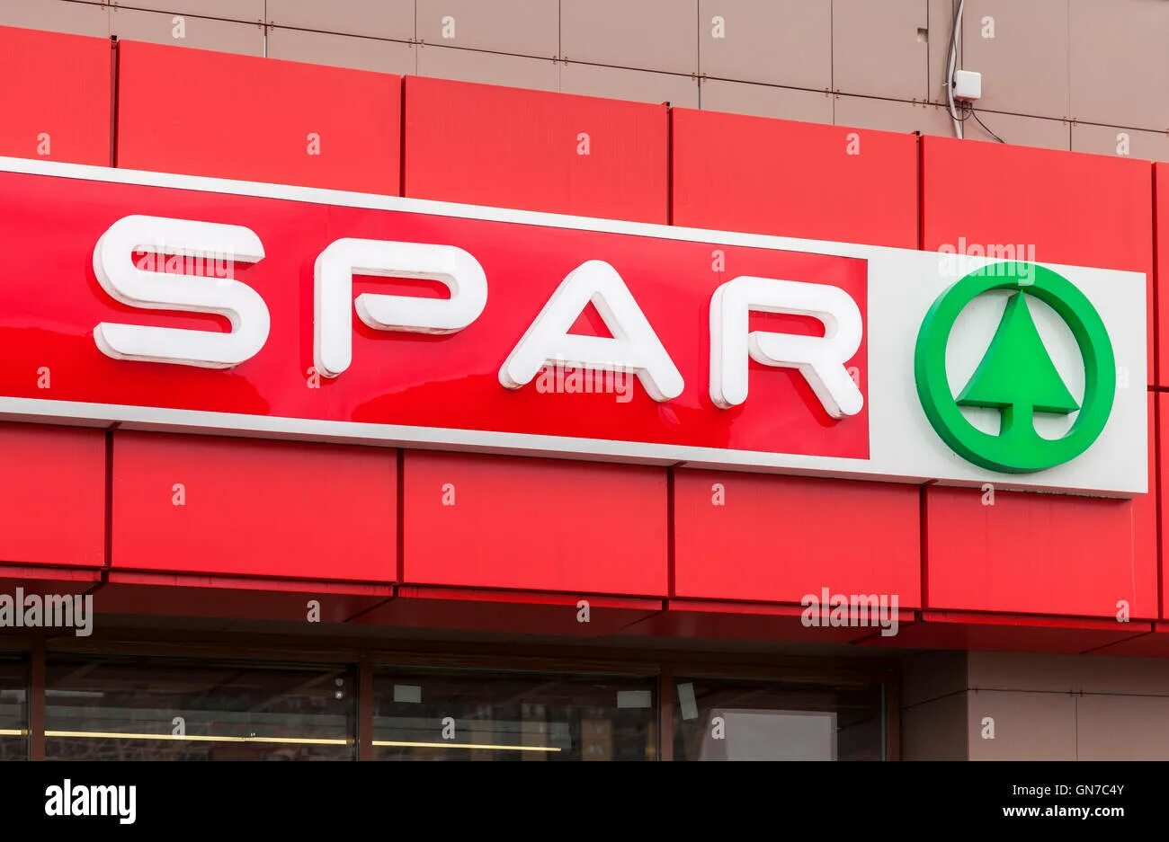 Спар часы. Магазин Spar в Томске. Spar вывеска. Spar логотип. Магазин Спар вывеска.