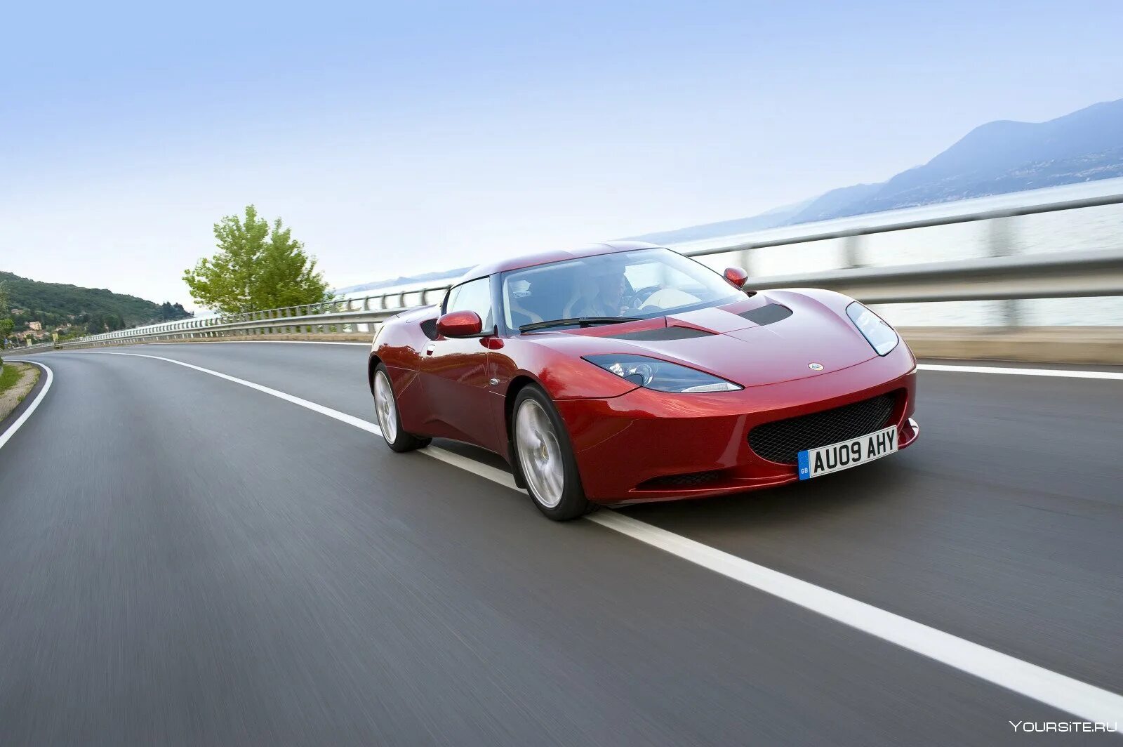 Автомобиль разгоняется. Lotus Evora красный. Lotus Evora 2009. Lotus Evora 0-100. Lotus Evora 1.