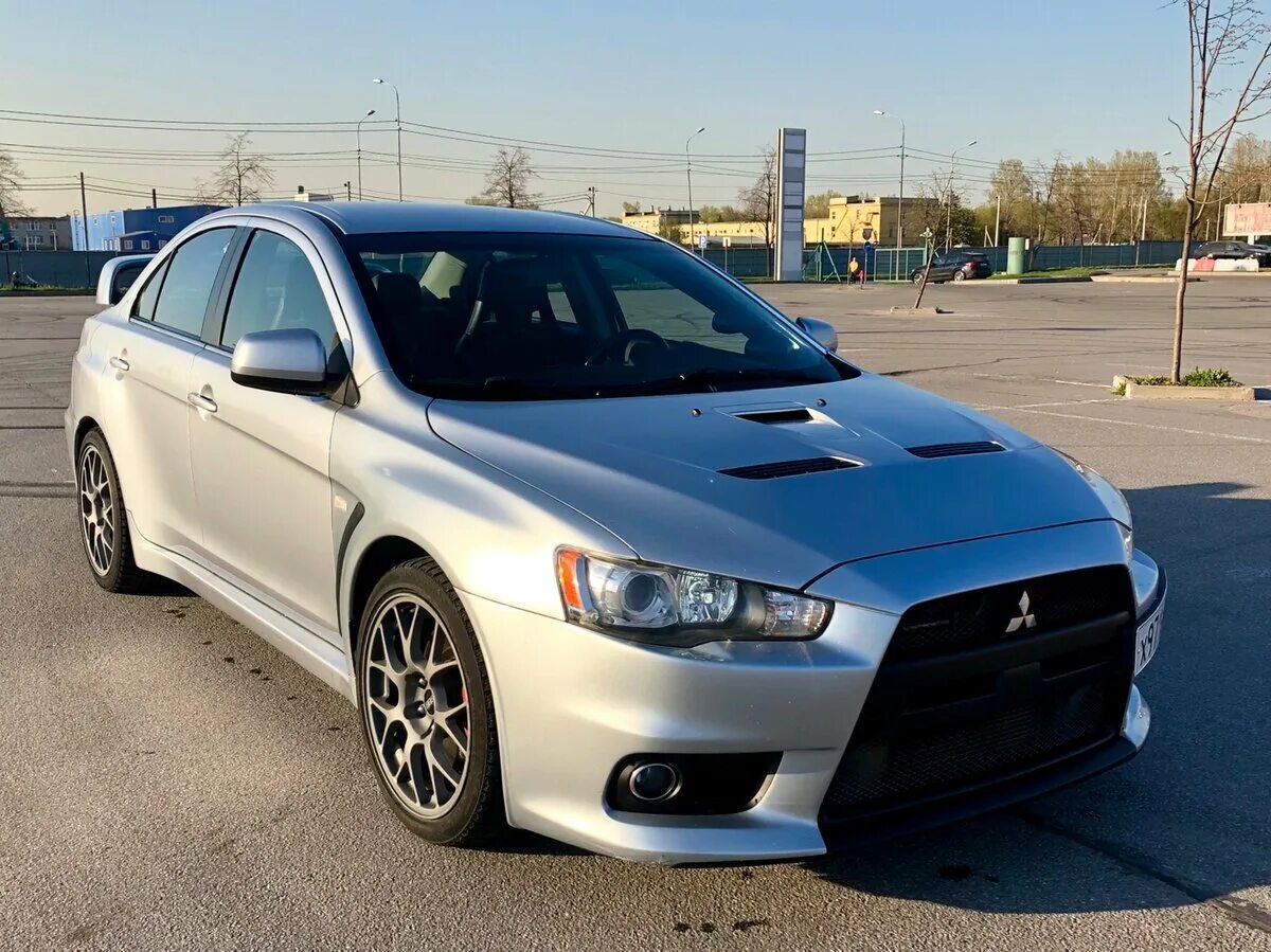 Купить митсубиси недорого. Mitsubishi Lancer Evolution x 2008. Lancer EVO 10. Lancer Evolution 10 2008. Lancer 10 2.0.