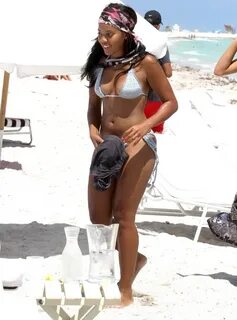 Hottie Hude Boobs: Angela Simmons busty booty in bikini on a beach in Miami...