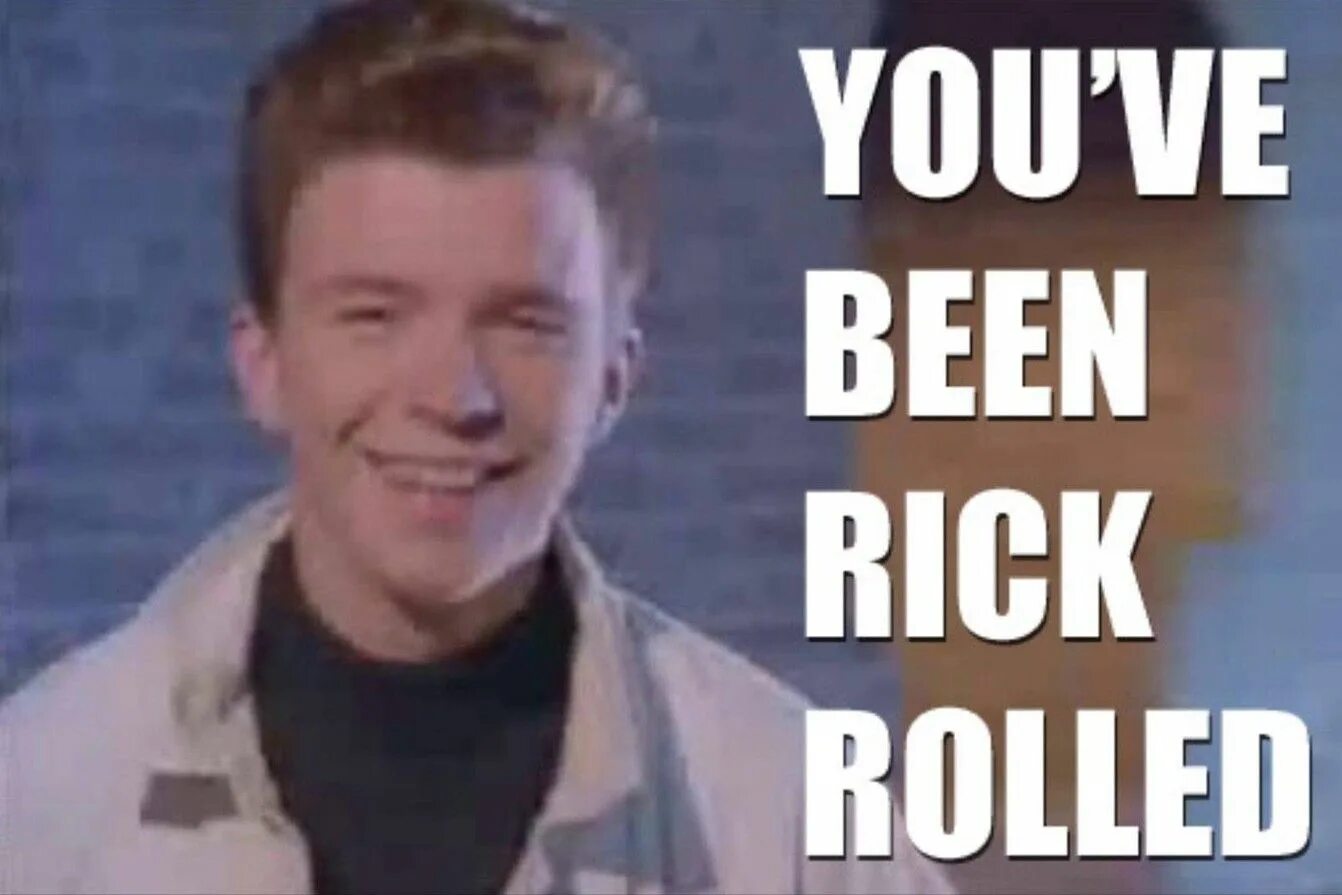 Рикролл мем. Rick Astley. Rick Astley рикролл. Rick Astley 1993. Рик Эстли never gonna give.