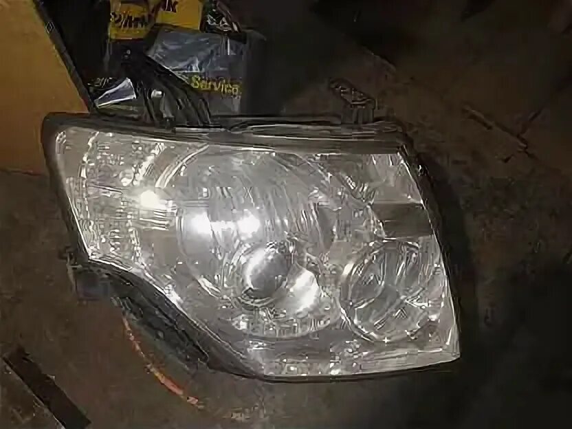 Led фары на mitsubishi pajero 4. Pajero 4 фара ксенон. Фара передняя паджеро 4. Передние фары митсубиси паджеро 4. Фара передняя паджеро 4.