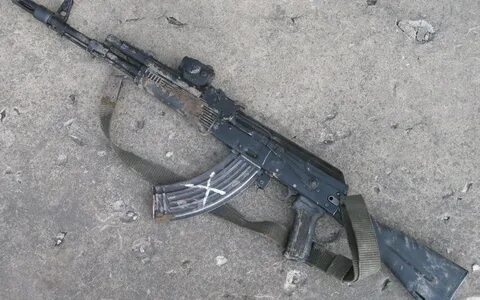Автомат в грязи