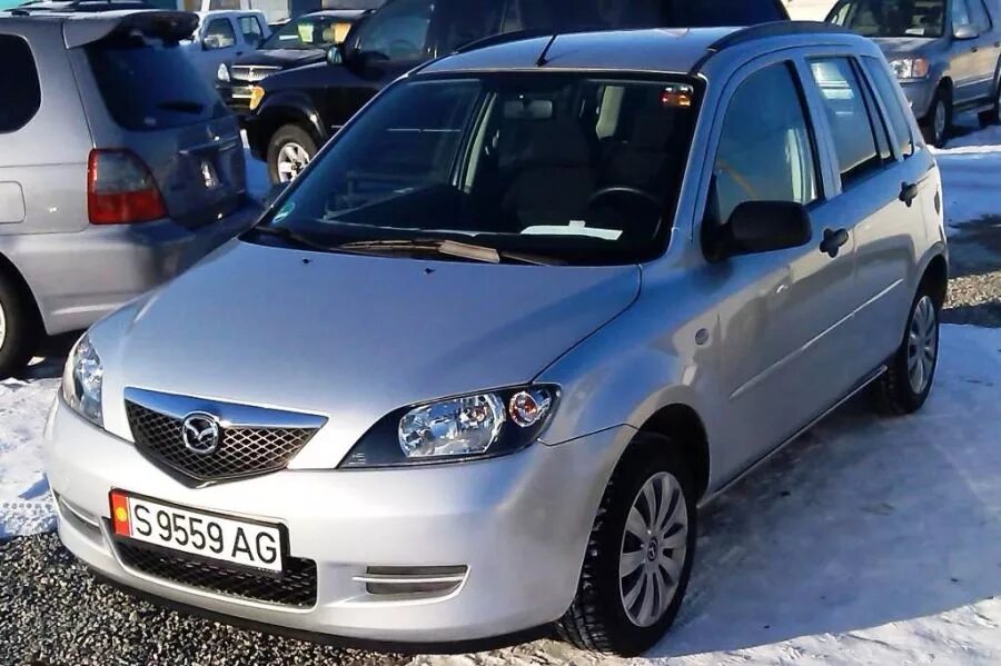 Праворукие машины б у. Mazda Demio 2, 2003 левый руль. Мазда 2 Демио 2003. Mazda Demio левый руль. Mazda Demio хэтчбек 2003-2007.