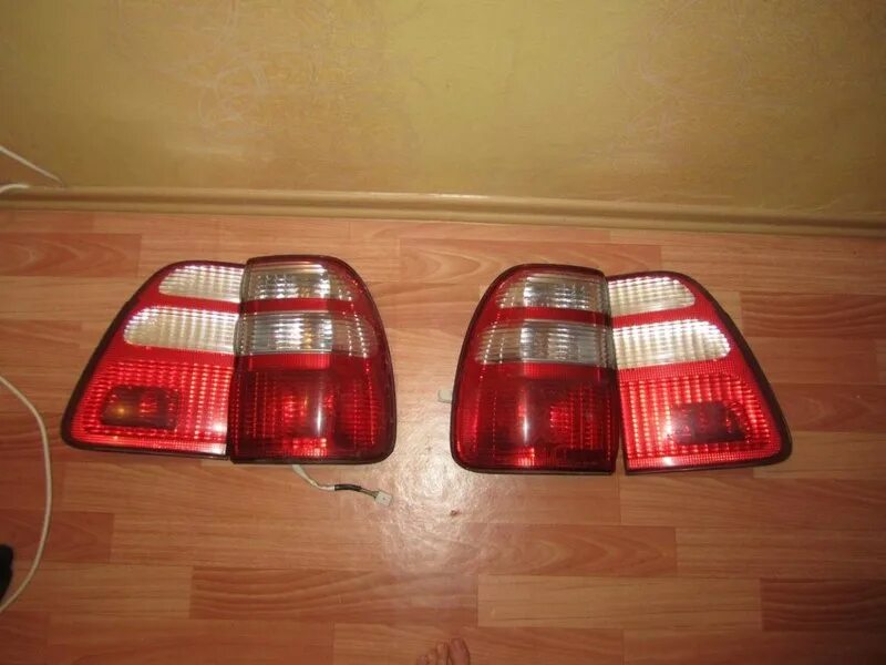 Задние фонари ленд крузер 100. Фонари toyota land cruiser 100. задние фонари toyota land cruiser 105. задние фары toyota land cruiser 100.