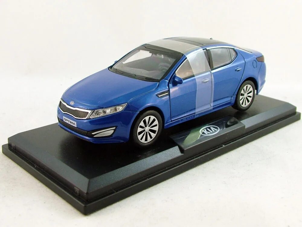 Коллекционный автомобиль 1 43. Kia Optima 1/43. Модель Киа Церато 2 игрушка. Kia Cerato 4 модель 1 43. Киа Оптима игрушечная модель.