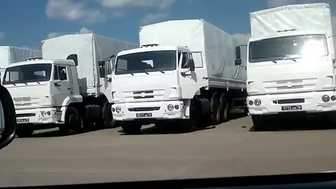 Камаз на белом покрывале