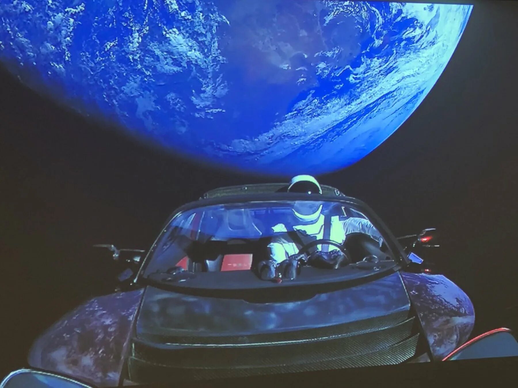 Илон Маск Тесла в космосе. Tesla Roadster в космосе. Space car