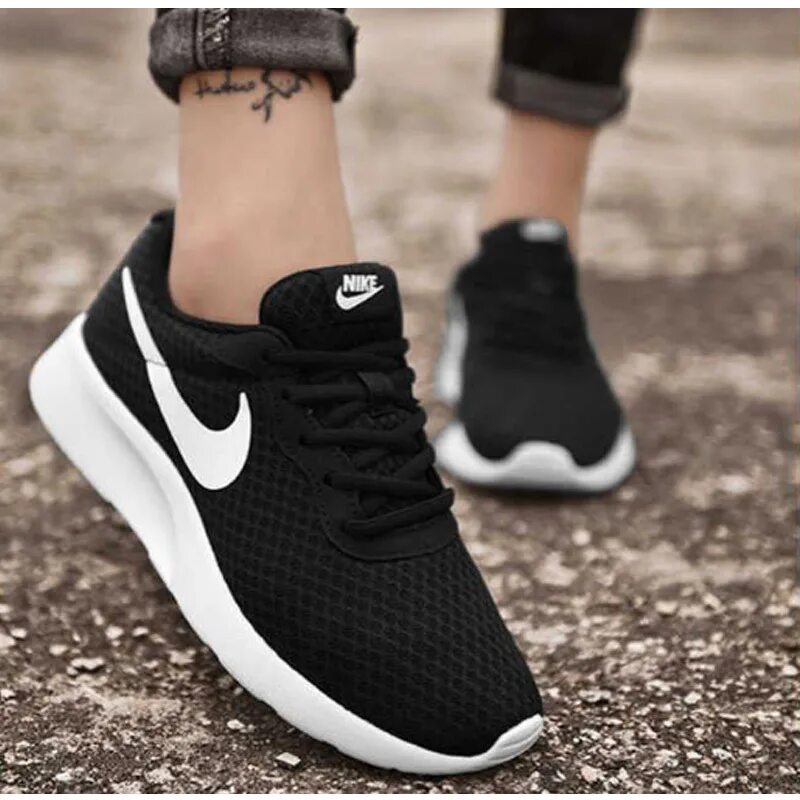 Черные найк цена. Кроссовки Nike Tanjun черные. Nike Tanjung 2019 мужские. Найки черные Nike Run. Кроссовки найк Tanjung женские черные.