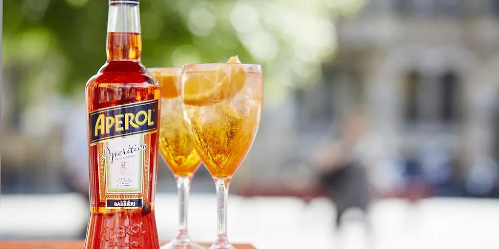 Что такое апероль и с чем его. Апероль шприц. aperol spritz коктейль. просекко для апероль шприц. ликер апероль аперитив.
