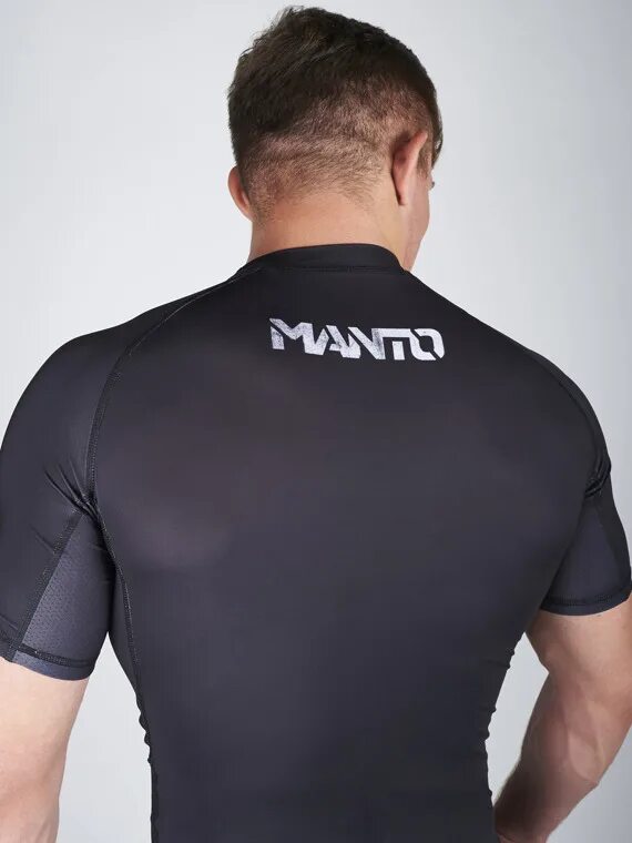 Manto ultra купить. Рашгард Manto logo Black. Фирма Manto борцовская. Наклейка Manto. Борцовская футболка Manto.