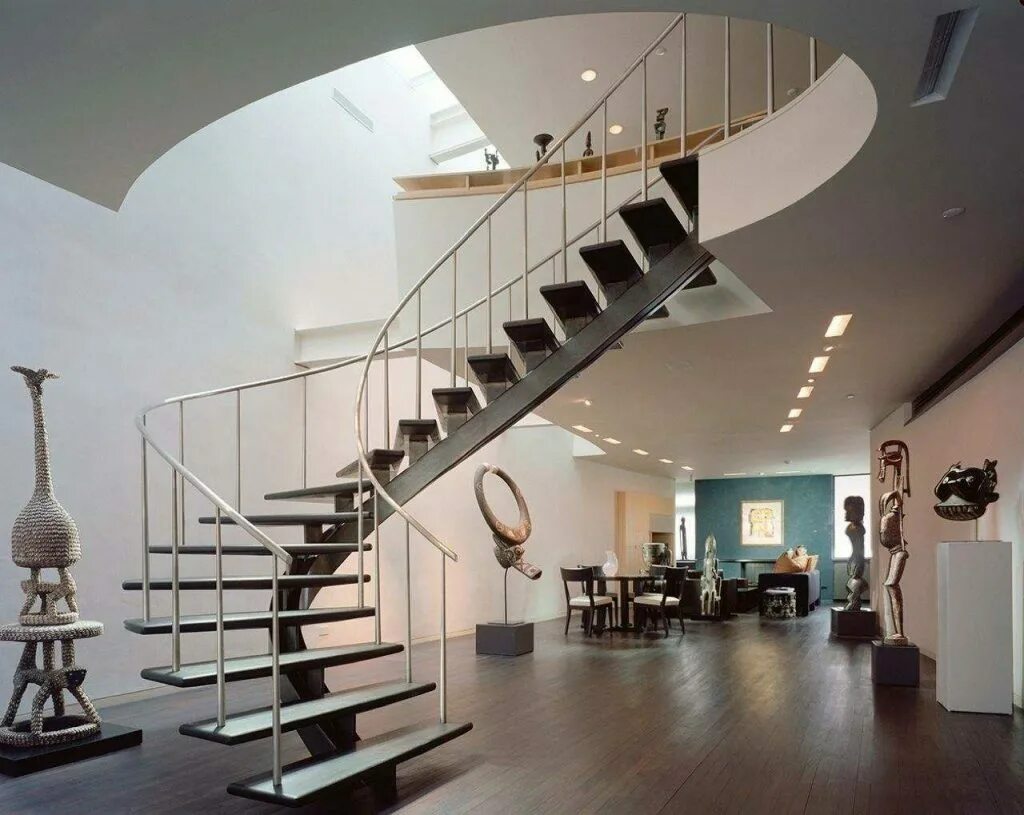 Лестница. Полувинтовая лестница на второй этаж. Винтовая лестница на монокосоуре. Полувинтовая лестница на второй этаж из металла. Красивые металлические лестницы.