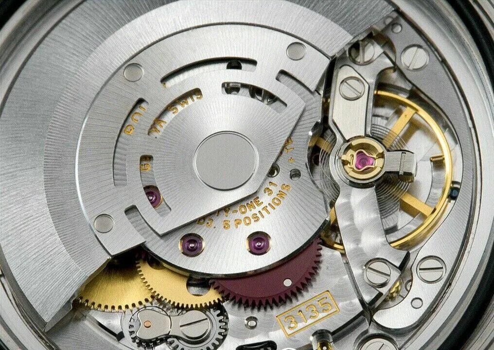 Rolex 3186. Rolex cal. Механизм ролекс. Механизм ролекс. Часовой механизм rolex.