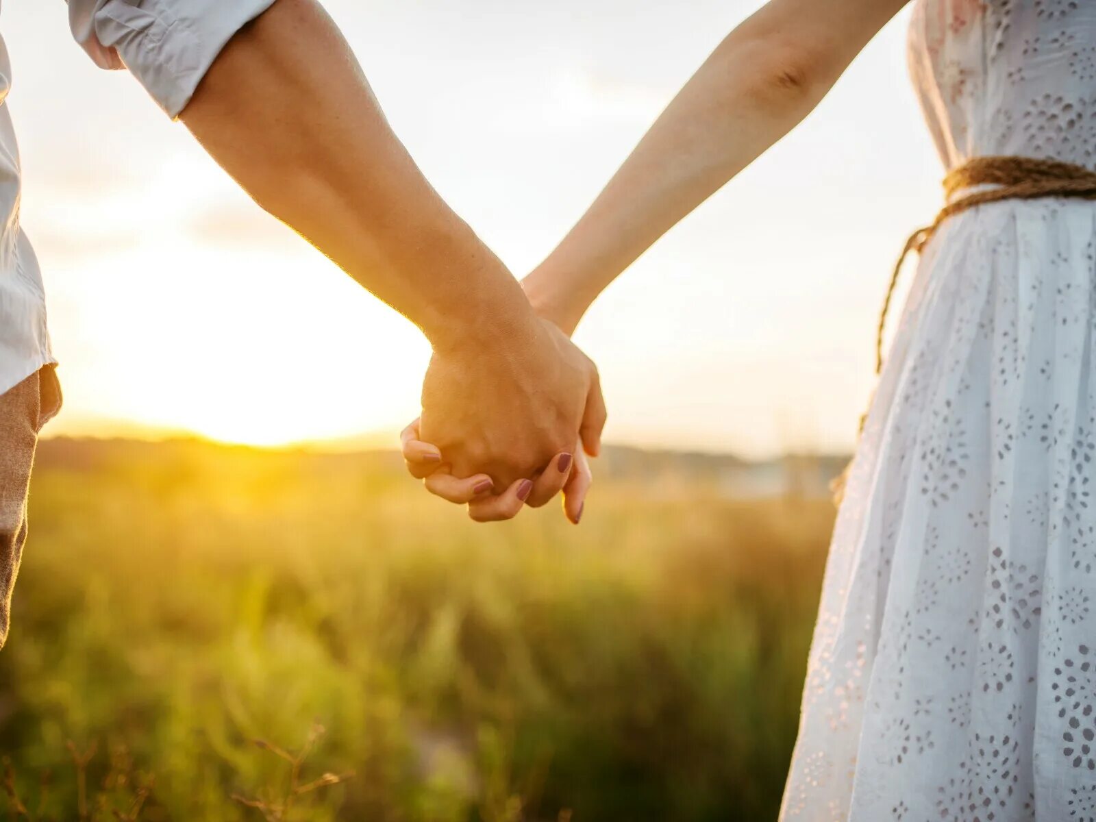 Hand in hand with one another
