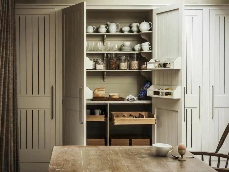 Image from Houzz. Love the appliance hide away cupboard and the lazy Susan corne