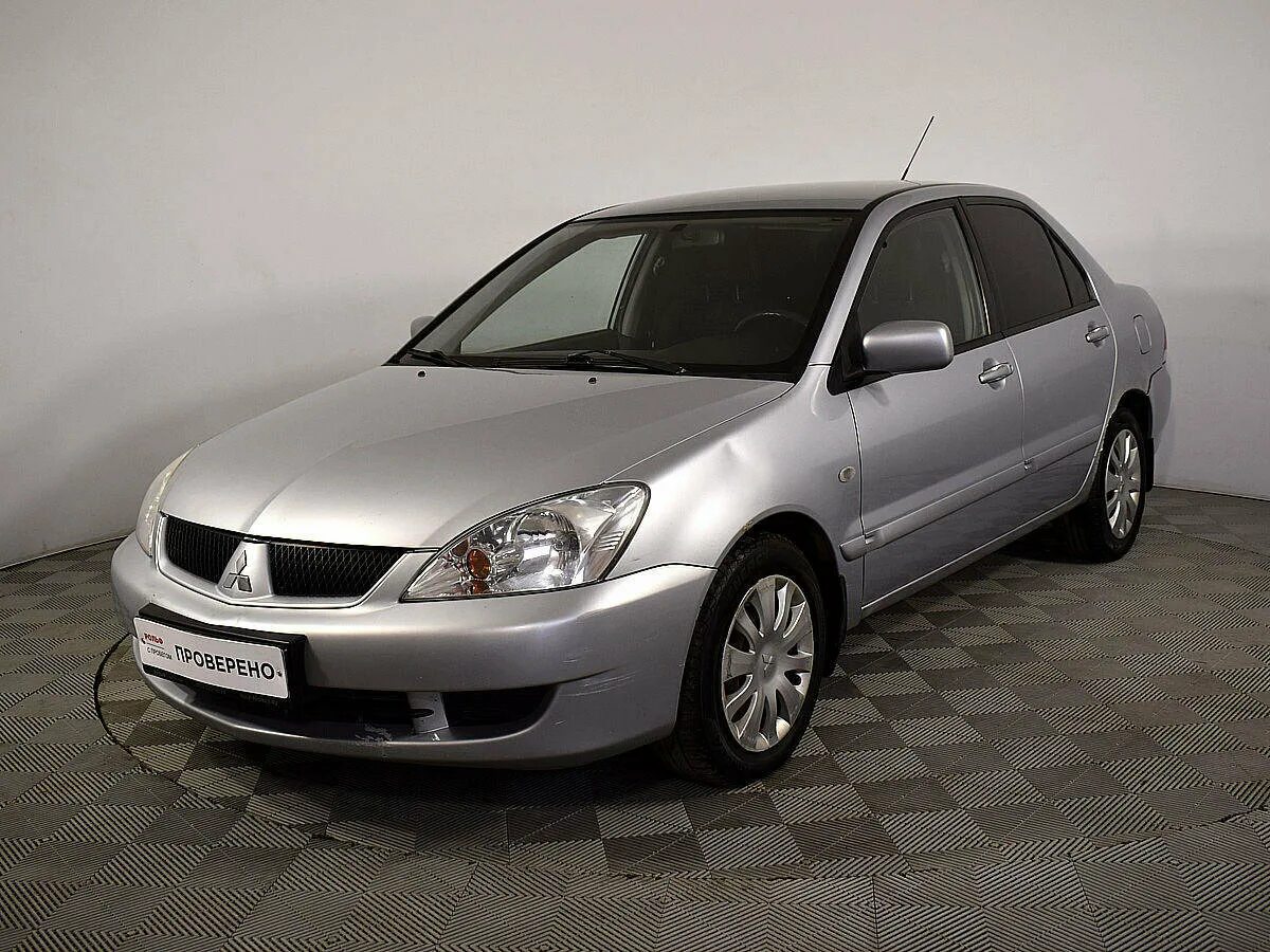 Лансер 9 купить новую. Митсубиси Лансер 9. Mitsubishi Lancer 1.6 2006. Mitsubishi Lancer 9 1.6. Mitsubishi Lancer 9 2010.