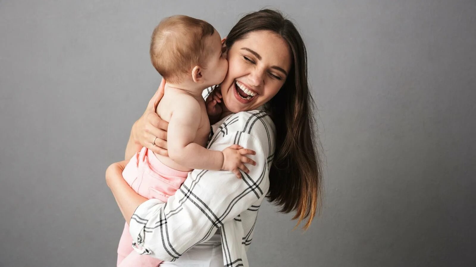 Young mother like. Photo portrait of a joyful young mother.