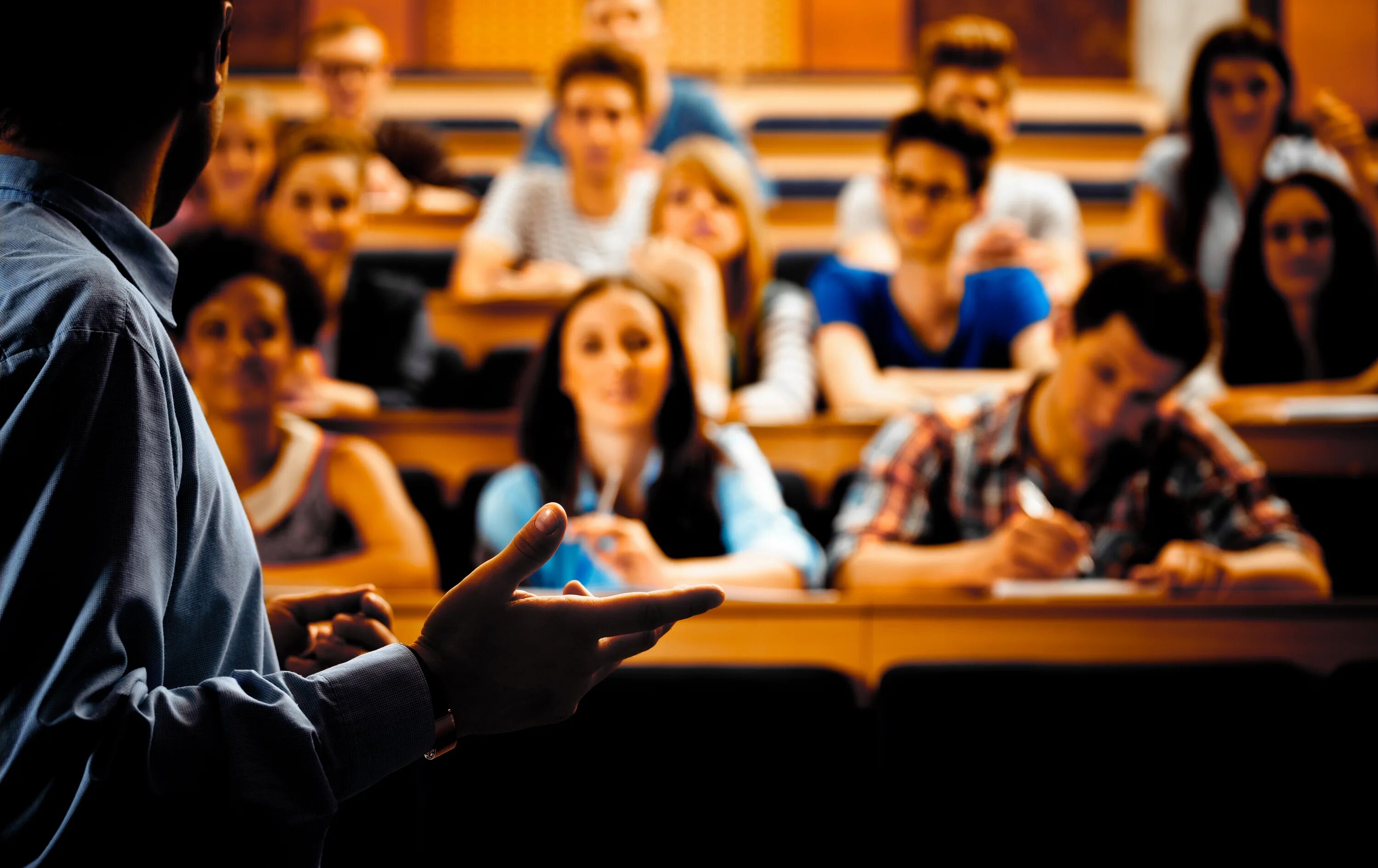 The students are the lecture. Студенты в аудитории. Лекция в вузе. Лекция в аудитории. Преподавание в вузе.