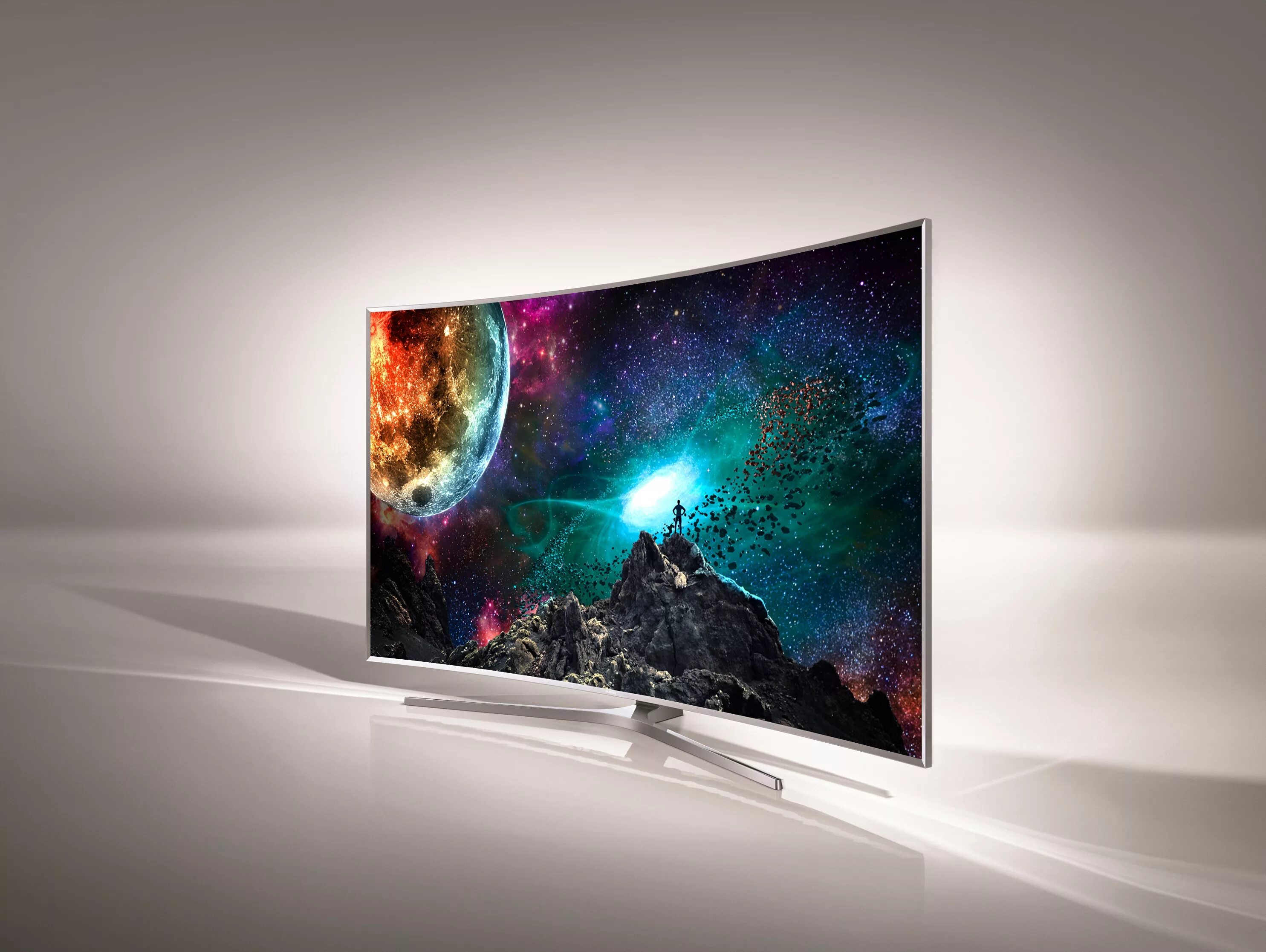 Новые телевизоры отзывы. Изогнутый Samsung SUHD. Samsung TV 2022.