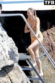 Sienna Miller Looks Sexy in an Orange Bikini Out on Holiday in the South of...