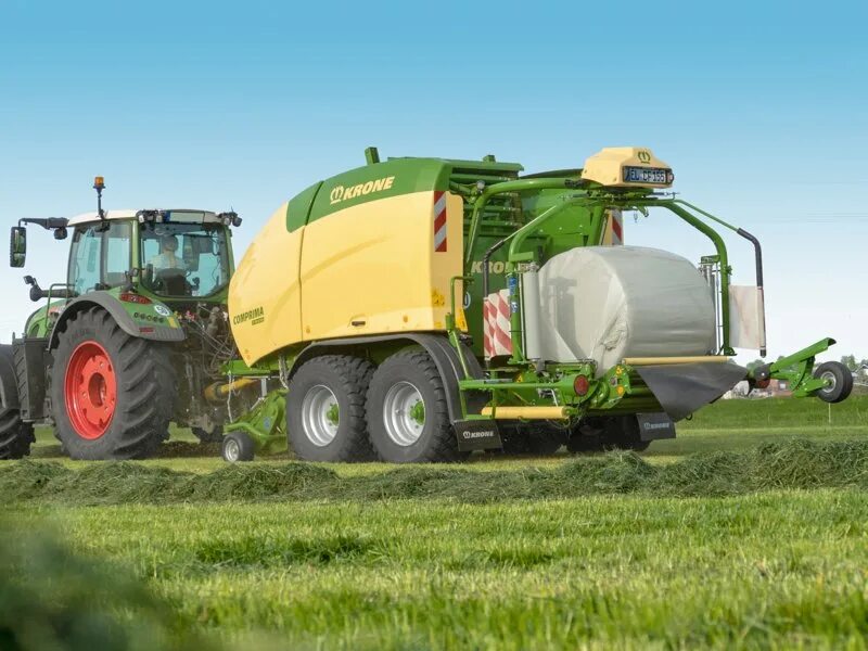 Пресс подборщик кроне. Krone Comprima CF 155 XC. Comprima CF 155 XC Plus. Пресс подборщик Krone Comprima cf155 XC. Пресс-подборщик рулонный Krone Comprima f 155 XC.