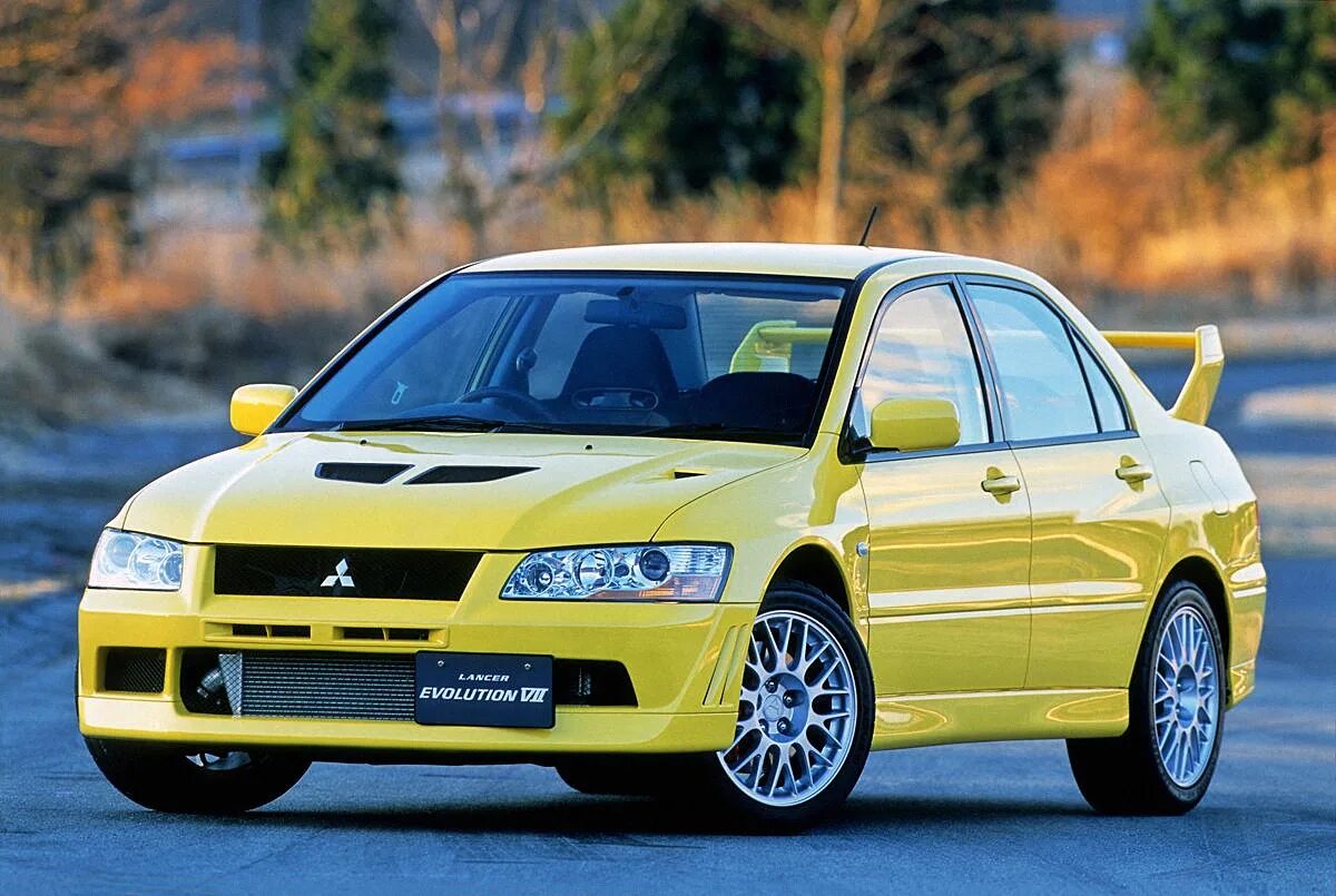 Mitsubishi lancer 2001. Mitsubishi Lancer Evolution VII. Mitsubishi EVO 7. Mitsubishi Lancer Evolution 7 поколение. Mitsubishi Lancer EVO VII 2002.