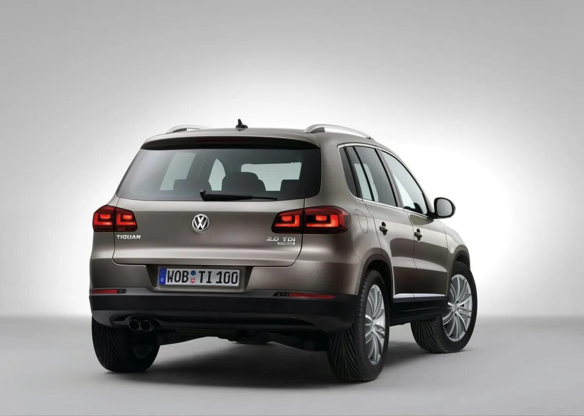 Фольксваген тигуан 2015. Фольксваген Тигуан новый 2011. Volkswagen Tiguan 2012 сзади. Фольксваген Тигуан 3. Фольксваген Тигуан 1 поколение.