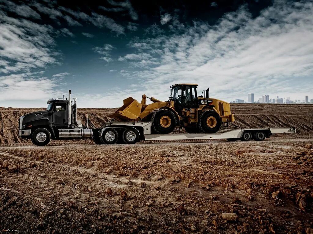 вольво а 40 ф. самосвал катерпиллер 797. современная строительная техника. Jcb 3cx. Caterpillar ct660 в россии.