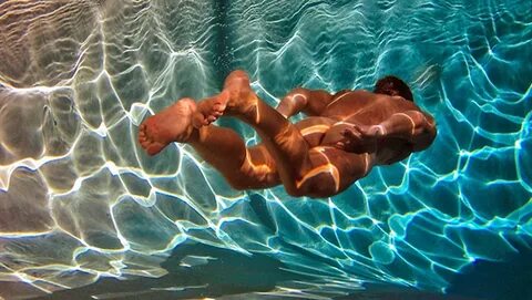 Men swimming naked.