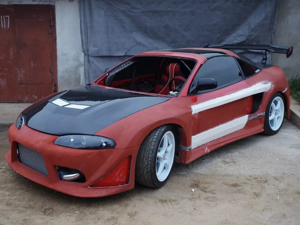 Мицубиси эклипс цена. Mitsubishi Eclipse 2. Mitsubishi Eclipse RS 2g. Mitsubishi Eclipse 2 EVO. Митсубиси Эклипс 2022.