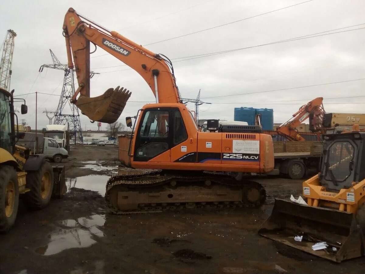 Jcb 205 габариты. габаритный гусеничный экскаватор. габаритный гусеничный экскаватор. гусеничный экскаватор габаритный. Doosan solar 225nlc-v.