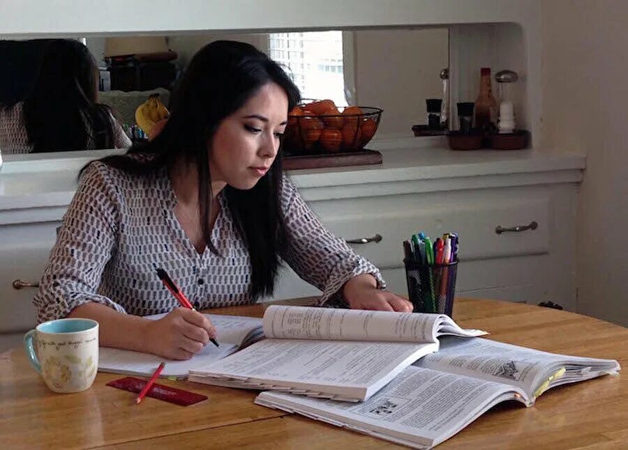 Мама делает уроки с дочкой. Mary is doing homework. Teenager do homework. Mary is doing homework. Teenage does homework.