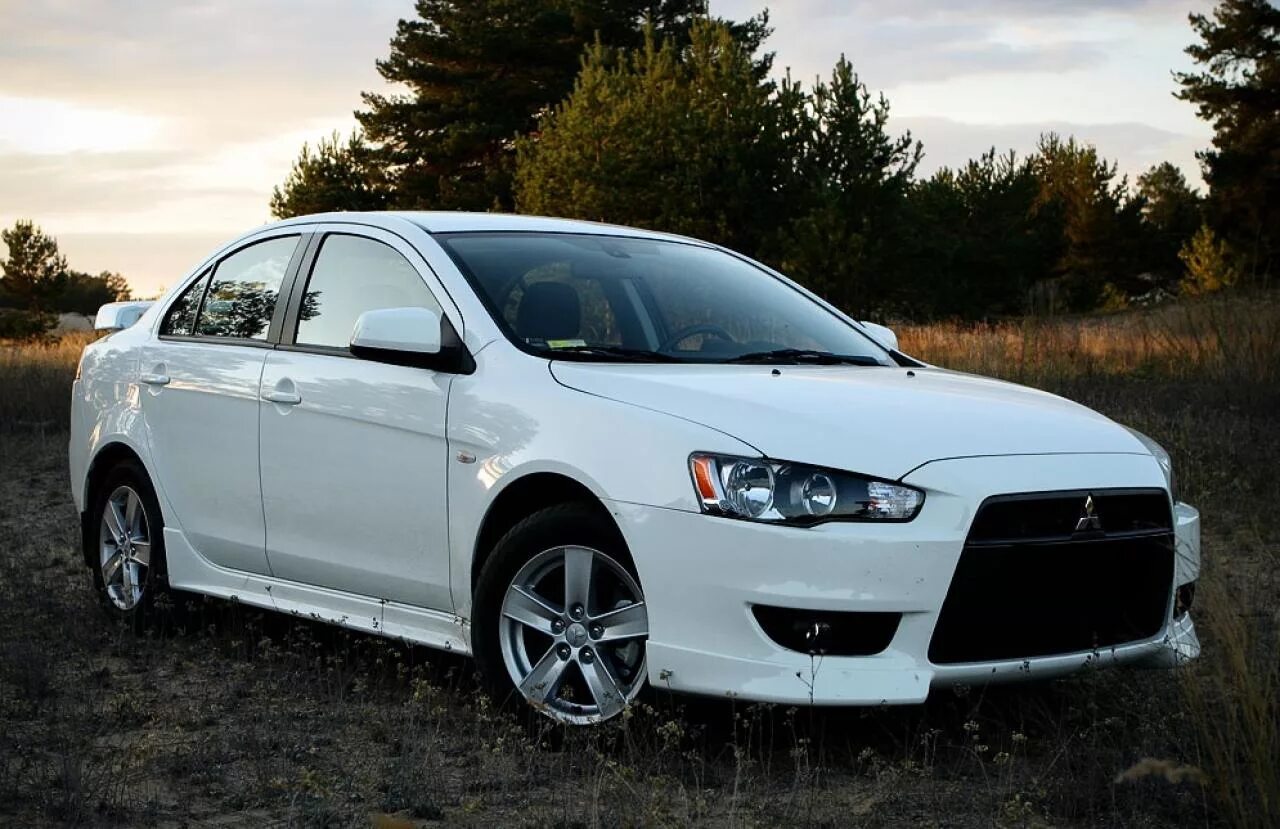 Lancer 10 кузов. Митсубиши Лансер 10. Mitsubishi Lancer 10 белый. Митсубиси Лансер 10 белый. Митсубиси Лансер 10 бедпя.