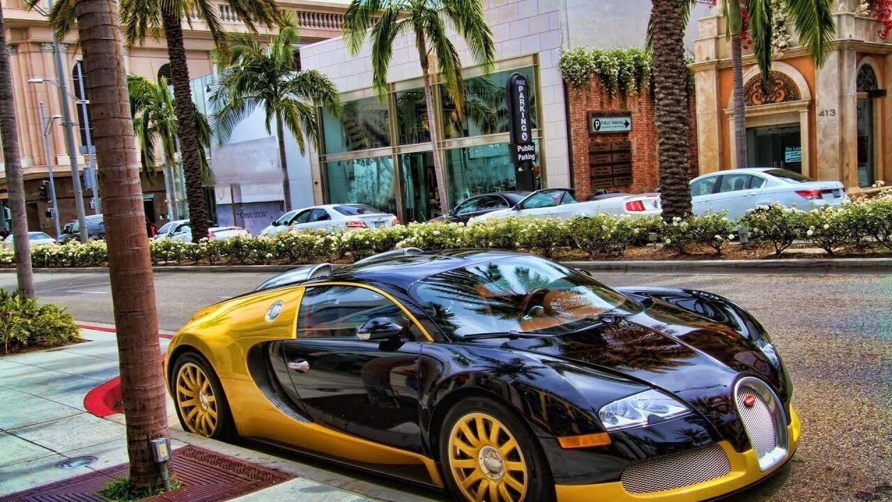 Luxury much. Бугатти Вейрон в Лос Анджелес. Бугатти Вейрон Лас санжелез. Бугати Широн в Лос Анджелесе. Bugatti Veyron в Лос Анджелесе.
