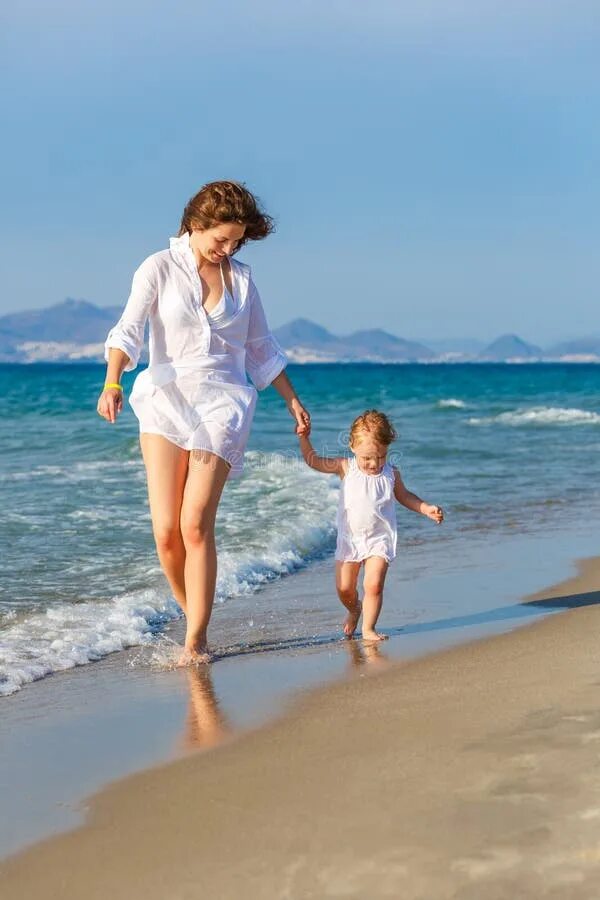 Mother and Daughter Running on the Beach Stock Photo - Image of mother, motherho