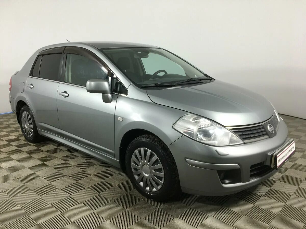 Ниссан тиида купить 2010. Nissan Tiida 2010. Ниссан Тиида 2010 года. Ниссан Тиида 2010 года хэтчбек. Ниссан Тиида 2010 седан.