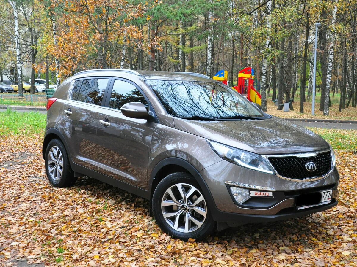 Киа спортейдж полный привод цена. Kia Sportage 3. Kia Sportage 2014. Киа Спортейдж 2014 Рестайлинг. Kia Sportage 2014 коричневый.