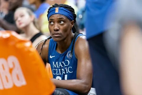 File:Sylvia Fowles (34) on the bench during a timeout in the Lynx vs Aces game.j