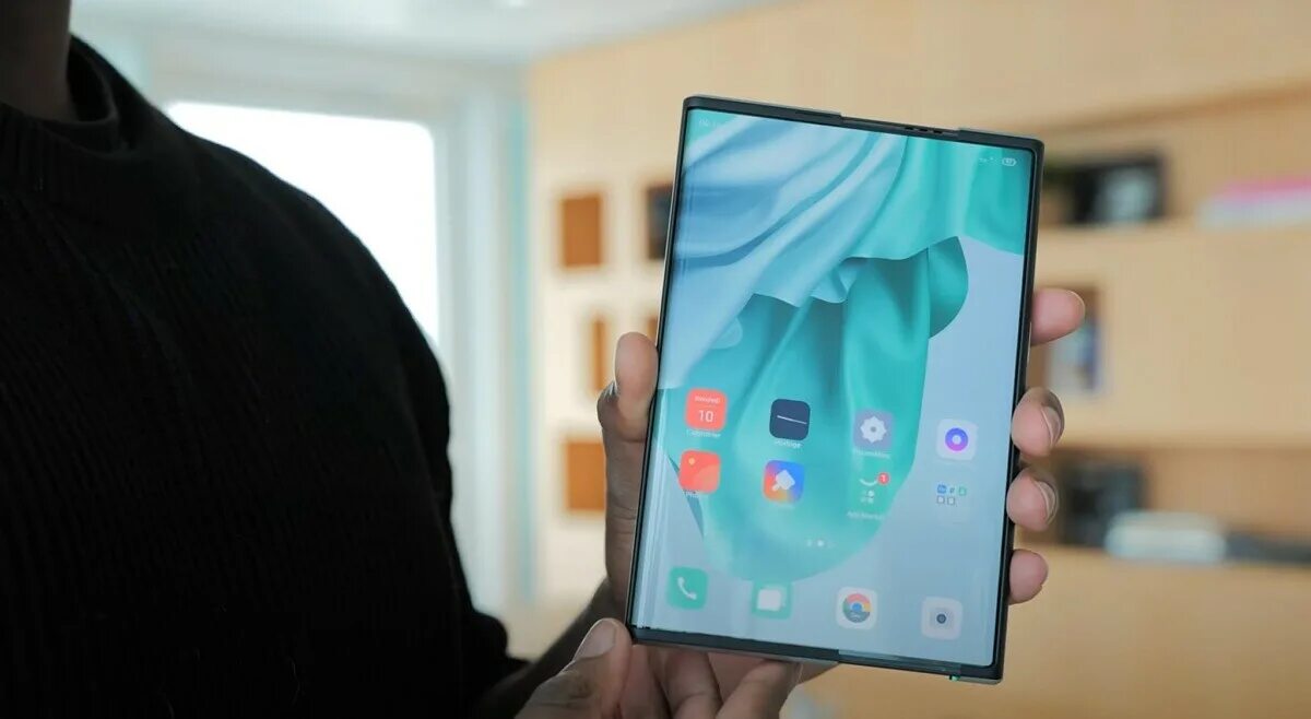 Раздвижные смартфоны 2025. Oppo x 2025. oppo раздвижной смартфон x 2025. новый оппо 2025. oppo растягивающийся смартфон.