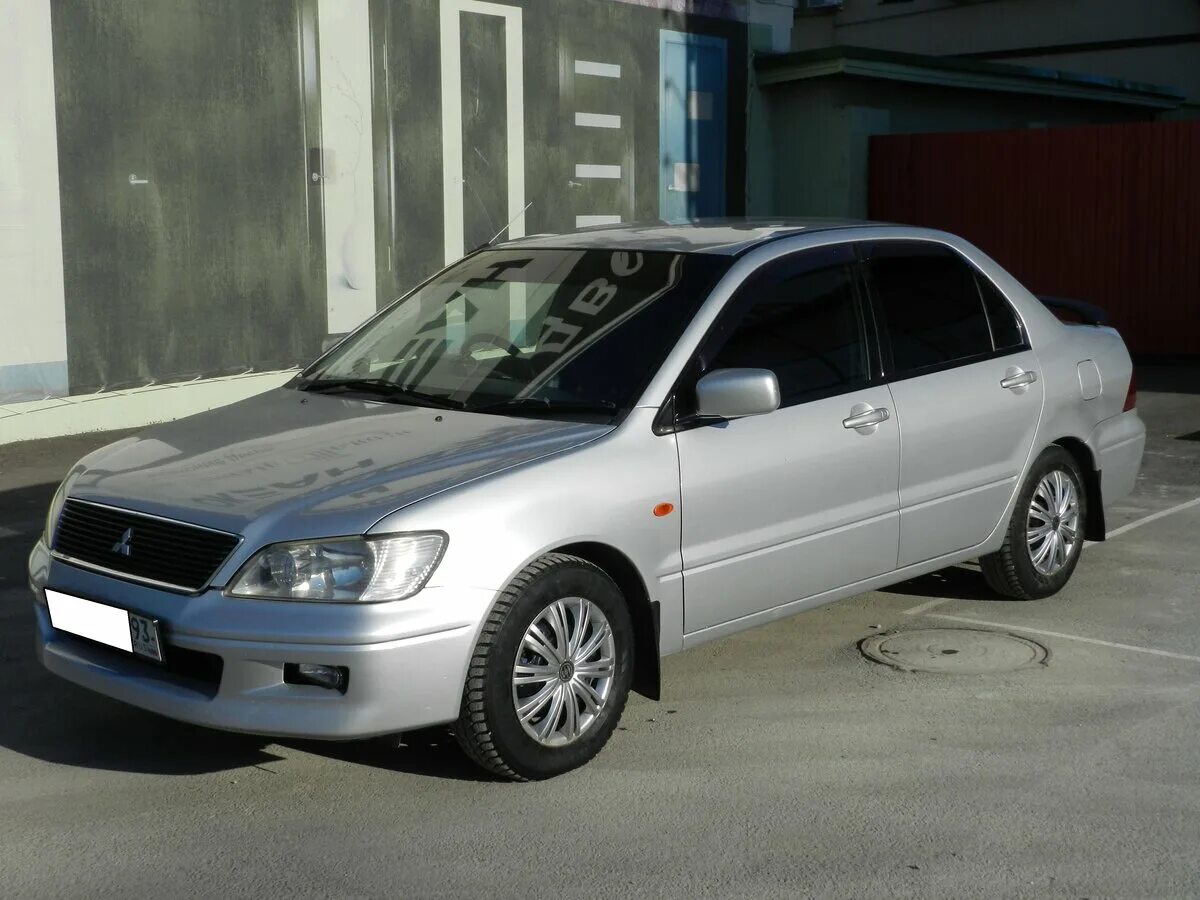 Митсубиси лансер цедия купить. Лансер цедия 2002. Mitsubishi Lancer 9 Cedia. Мицубиси Лансер Цедиа 2002. Mitsubishi Lancer Cedia 2002.