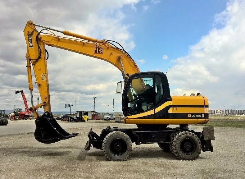 JCB js160w. Экскаватор JCB js160w. Колесный полноповоротный экскаватор JCB js160w. JCB 160w колесный экскаватор. Аренда колесного полноповоротного экскаватора