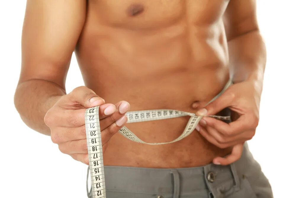 Сбросить вес живота мужчине. Мужчина с сантиметром. Мужчина с сантиметром на талии. Снижение веса мужчина. Мужчина похудение сантиметр.