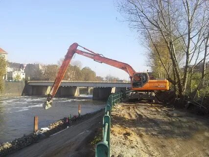 Экскаватор с длинной стрелой аренда