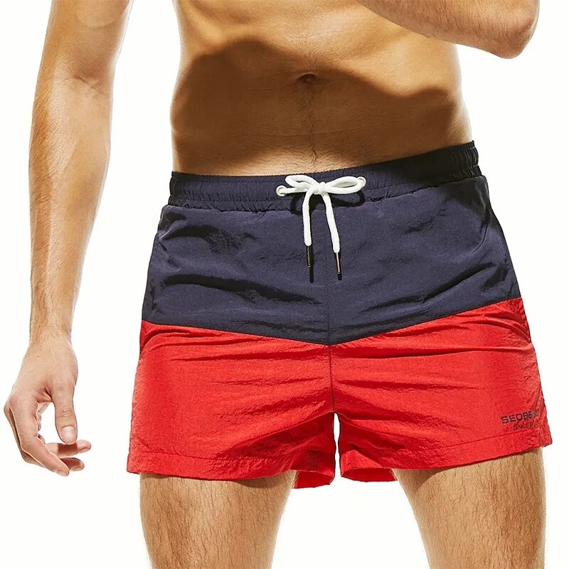 Мужские шорты недорого. Kitaro men одежда шорты мужские купальные. Мужские шорты Flatt nylon Auxiliary Pocket Swim. Мужчина в шортах. Пляжные шорты для мужчин.