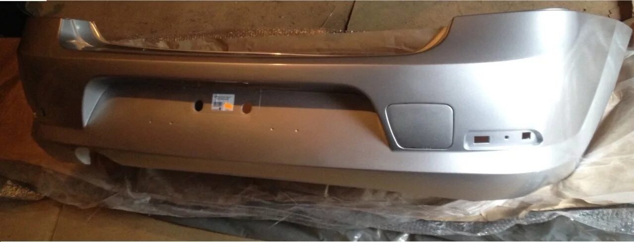 Renault 850224049r. Бампер передний renault logan 1. Задний бампер логан 1. Бампер передний логан 1 фаза 1. Задний бампер рено логан 1 sat.