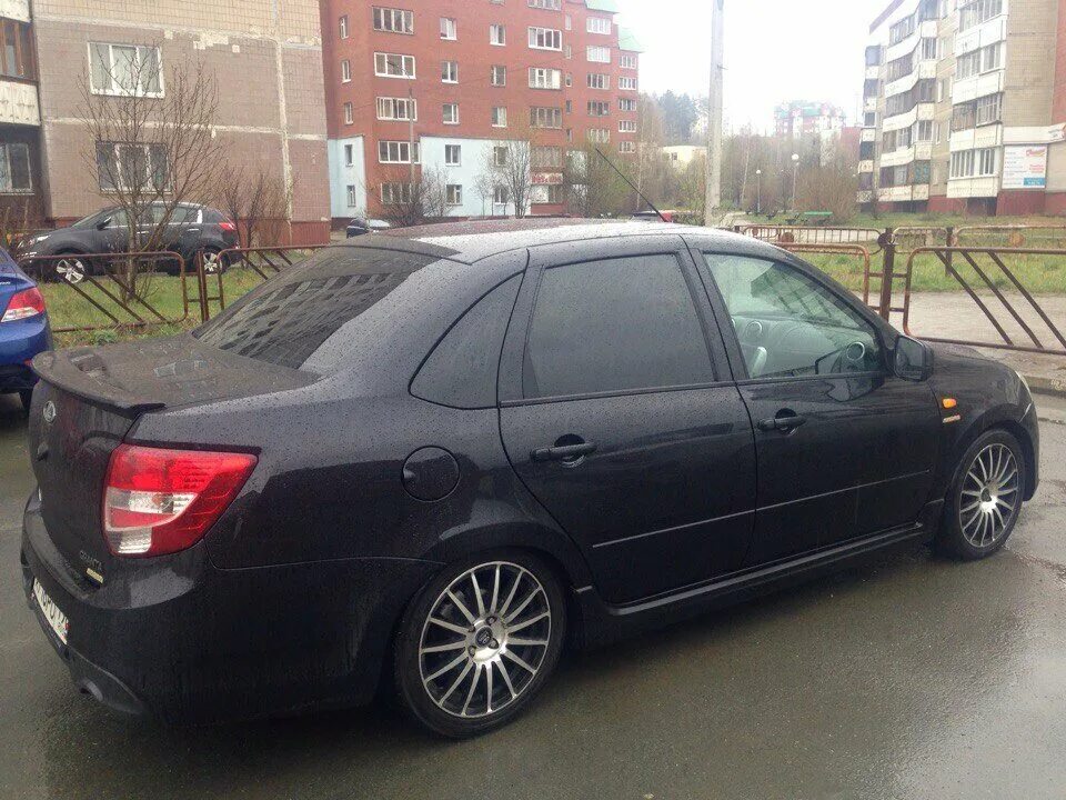 Lada granta 2014. Лада гранта спорт 2014. Лада гранта спорт седан белая. Гранта спорт 2014 год. Лада гранта спорт 118 л.