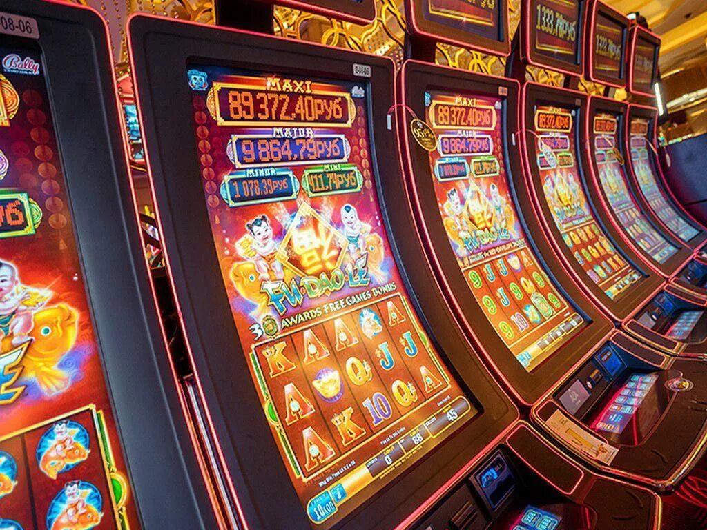 Игровые автоматы сейчас playmax1. Автомат казино. Игровой автомат казино. Зал игровых автоматов. Slot игровые автоматы.