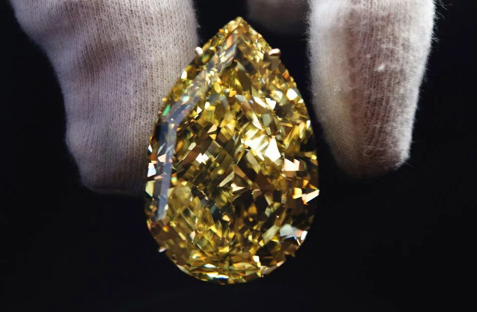 желтый бриллиант санси. капля солнца камень. капля солнца бриллиант. солнечный бриллиант. капля солнца бриллиант.