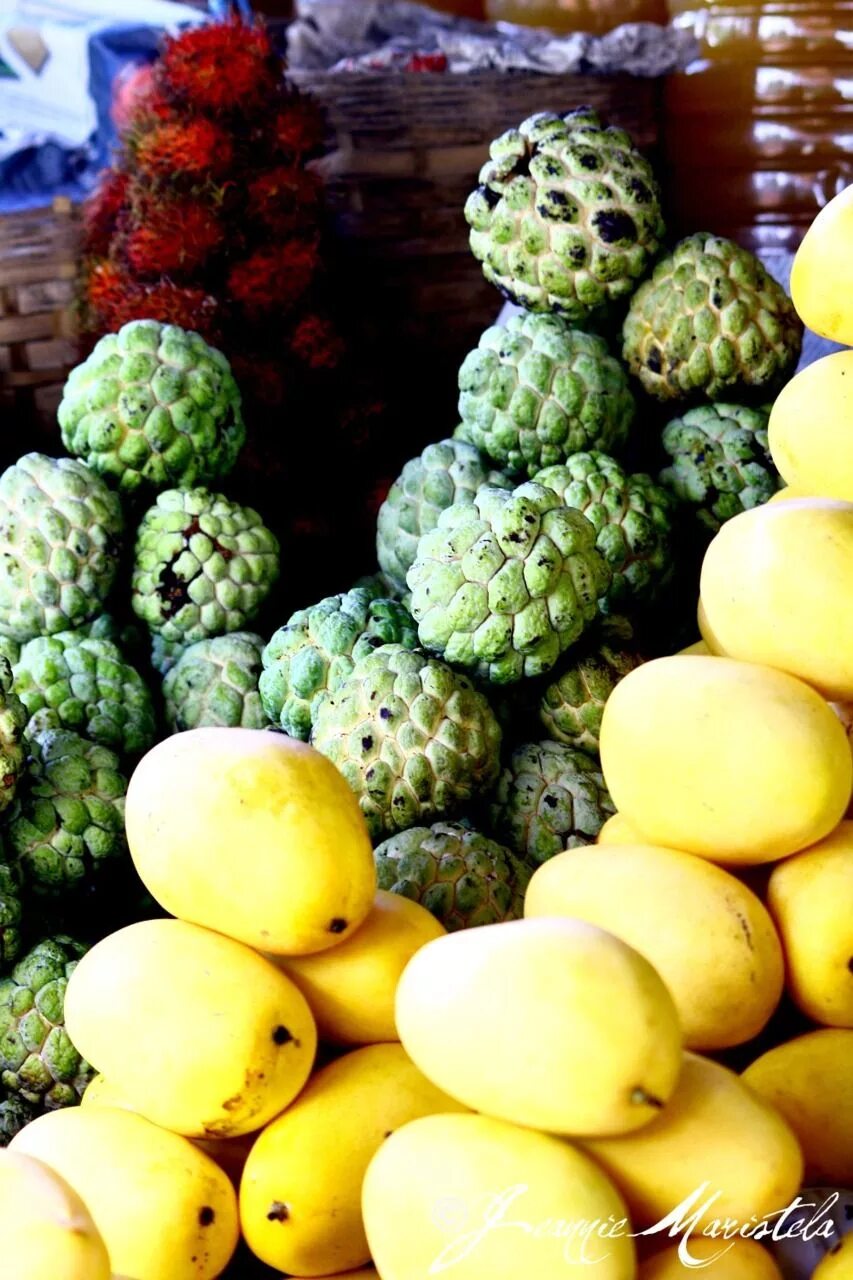 Ripe exotic fruits on a market in Vietnam free image download