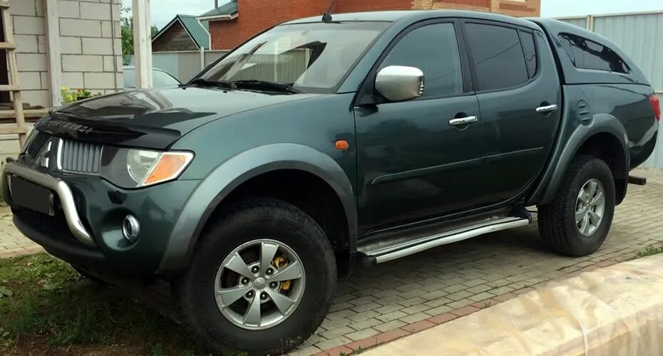 Mitsubishi l200 короткий. Митсубиси l200 2008. Митсубиси л 200 2012г. Митсубиси л200 2008.